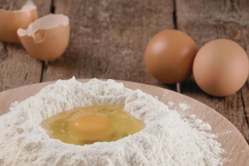 pasta making with egg and flour