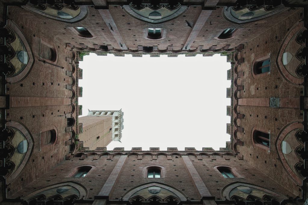 view looking up from the inner courtyard in palazzo pubblico